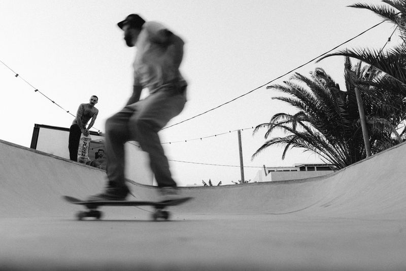A skater dropping into the bowl