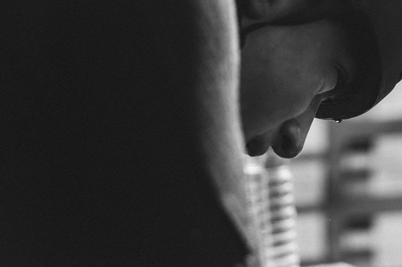 A close, half-lit profile of a face